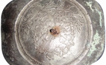 带有金代官府验镜标志铭文的铜镜